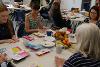 A group being led through a 'time travelling' imaginative exercise